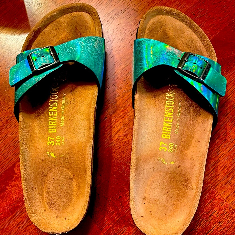 Birkenstock *discolored* holographic. Worn once .. not broken in ..